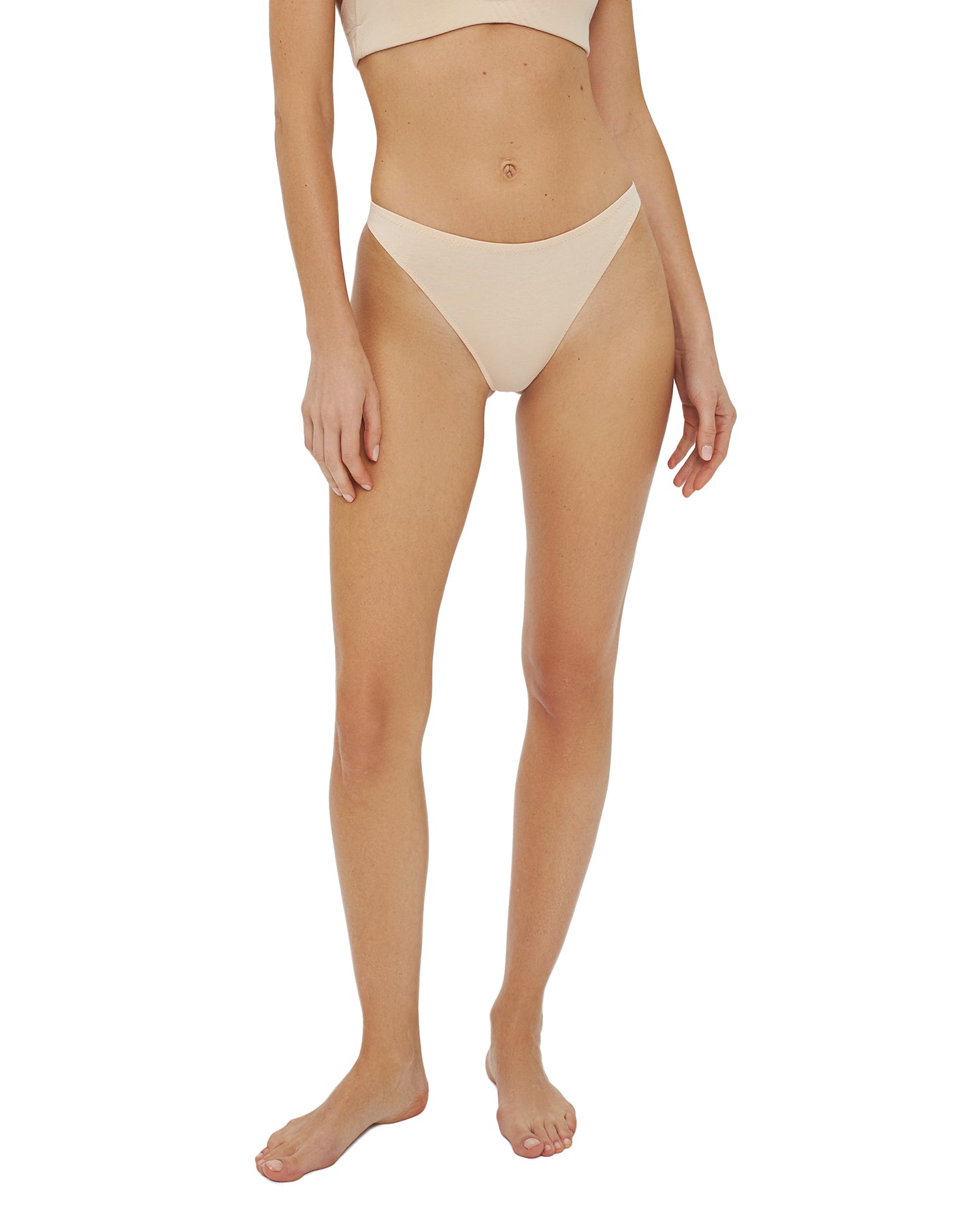 Cajsa Organic Cotton High-Waisted Thong in Beige, designed for a comfortable and stylish fit