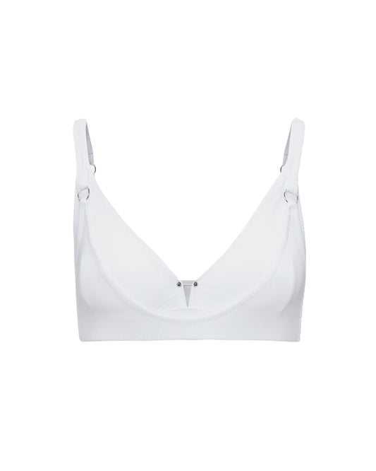 The Issy Organic Cotton Triangle Bralette with piercing detail in white.